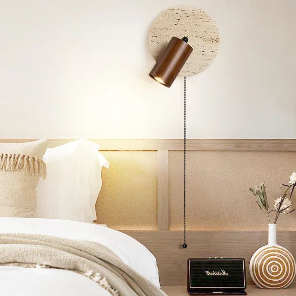 L'applique murale bois design LED en marbre arrondi avec chaînette élégante.